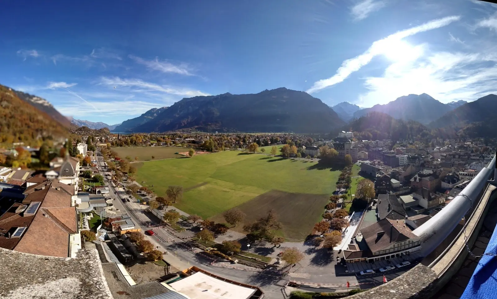 Interlaken town and the Hoheweg meadow seen from above with mountains behind
