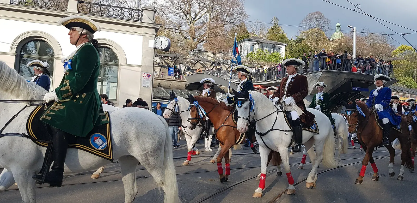 Costumed riders on horseback in the Sechseläuten parade in central Zurich